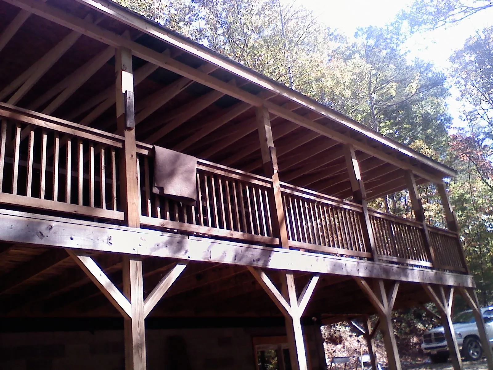 Timber framing under a new elevated porch and deck — Roof Leak Repair in Lynn by Roofing Brothers